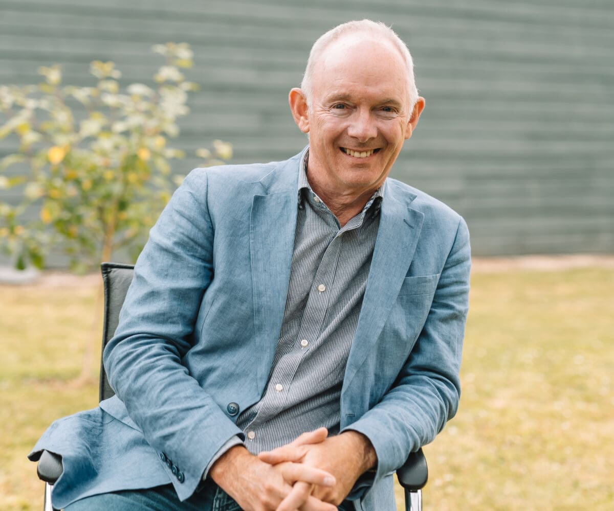 Geoff Underwood, Founder of WightAID, seated.